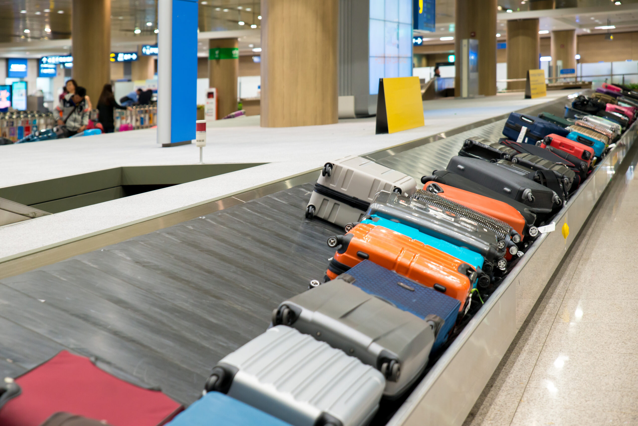 Suitcase or luggage with conveyor belt in the airport..